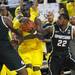 Michigan junior Tim Hardaway Jr. moves the ball through Michigan State senior Derrick Nix and sophomore Travis Trice in the second half against Michigan State at Crisler Center on Sunday, March 3, 2013. Melanie Maxwell I AnnArbor.com